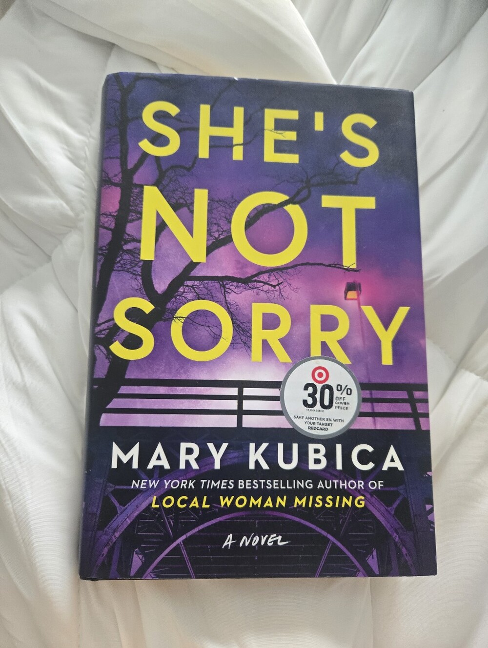 She's Not Sorry by Mary Kubica - Purple & Yellow Hardcover Novel